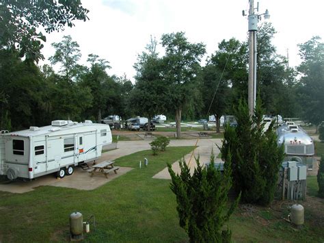 Hideaway campground - The Hideaway Retreat is a vintage waterfront campground with 742 ft of private beach, 50 RV sites, 10 Tent Sites and Beach House located in Navarre Florida. Nestled under oak and magnolia shade trees, our tent and RV camping retreat is a hidden gem. 